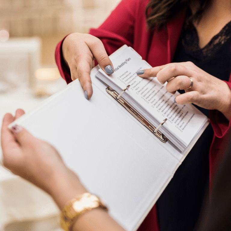 an event planner shows their av checklist to a colleague